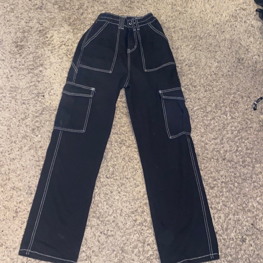 Black and white cargo pants, size small with an elastic waistband
